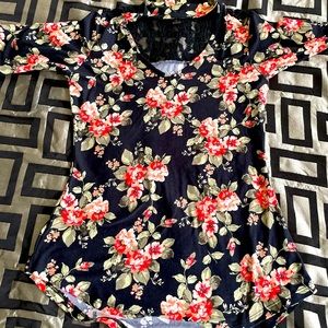 Woman’s floral shirt